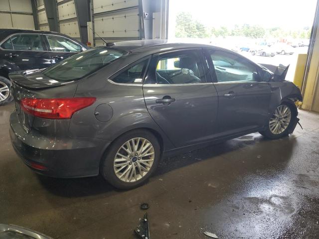 2015 FORD FOCUS TITA 1FADP3J28FL324308