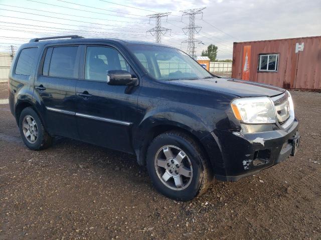 2011 HONDA PILOT TOURING - 5FNYF4H90BB011628