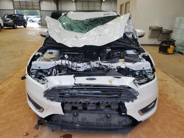 2017 FORD FOCUS TITA 1FADP3J25HL212620