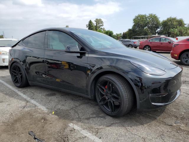 7SAYGDEF7NF350899 Tesla Model Y  4