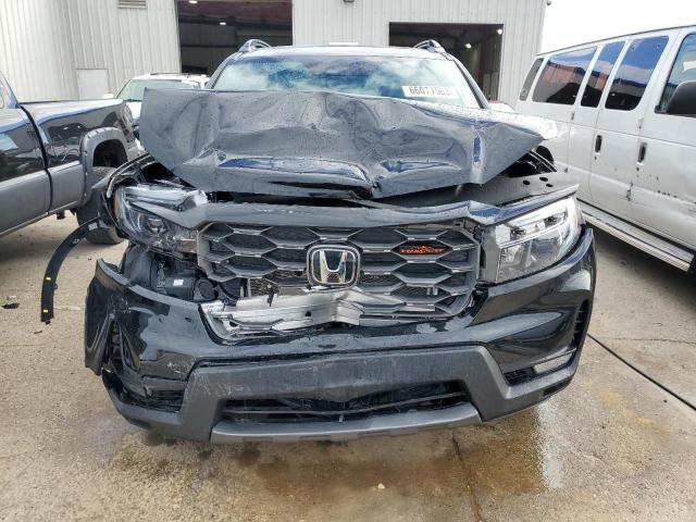 5FNYF8H64NB029888 Honda Passport Trail Sport