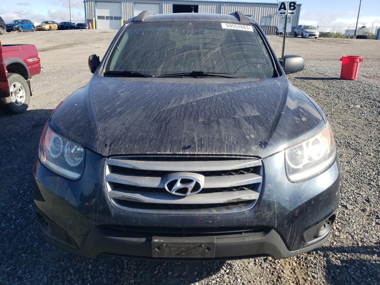 5XYZGDAB3CG098983 2012 Hyundai Santa Fe Gls