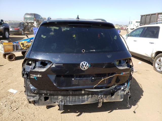 3VV2B7AXXKM058416 Volkswagen Tiguan SE 6