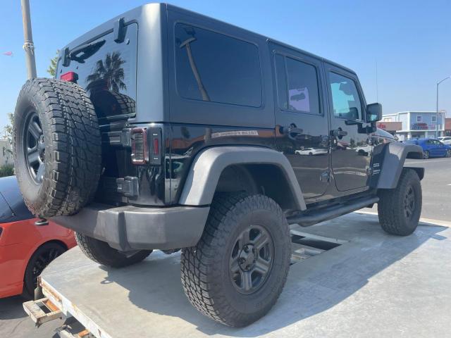 1C4BJWDG6EL325712 2014 Jeep Wrangler Unlimited Sport