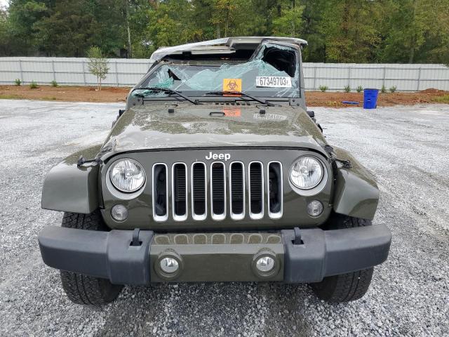 1C4GJWBG6GL124453 Jeep Wrangler Sahara