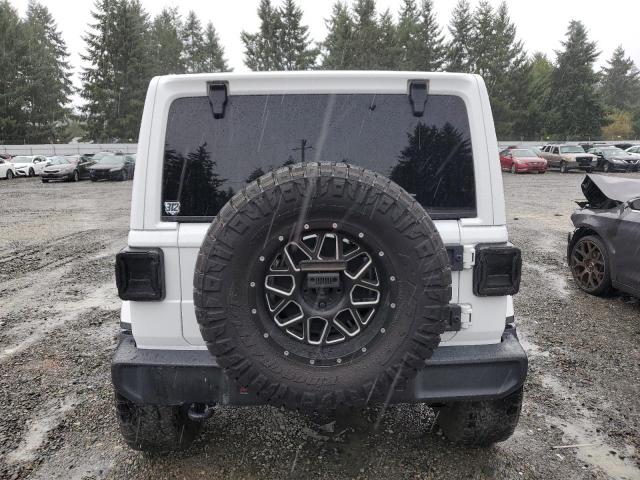 1C4HJXEG7JW289780 Jeep Wrangler Unlimited Sahara