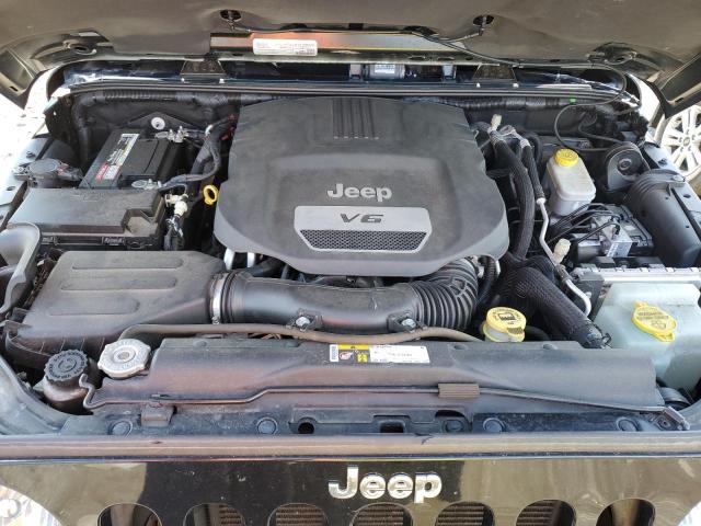 1C4AJWBG3FL704439 Jeep Wrangler Sahara