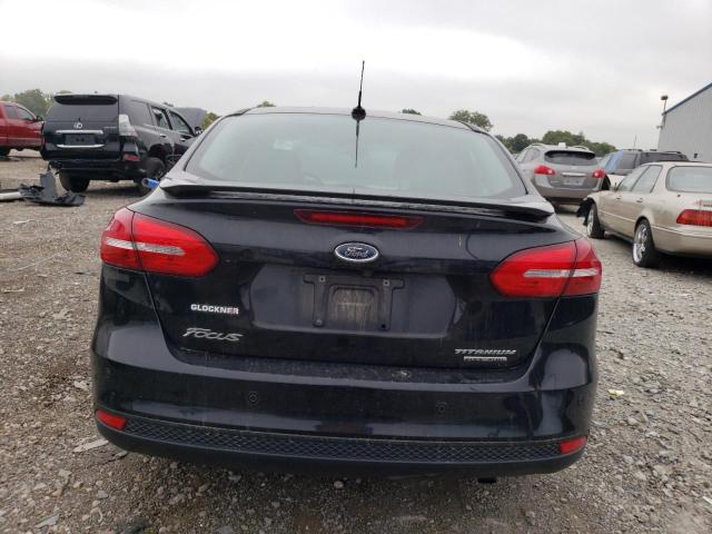 2015 Ford Focus Titanium VIN: 1FADP3J29FL229398 Lot: 67144823