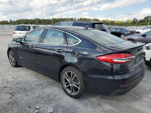 3FA6P0RU3KR277388 Ford Fusion TIT 2