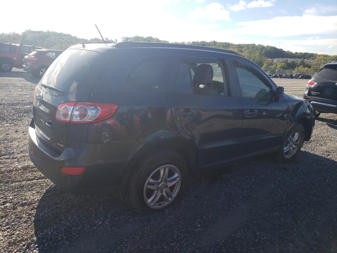 5XYZGDAB3CG098983 2012 Hyundai Santa Fe Gls