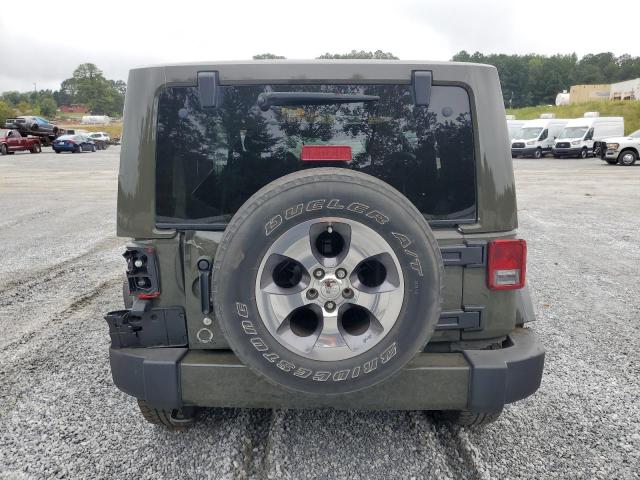 1C4GJWBG6GL124453 Jeep Wrangler Sahara