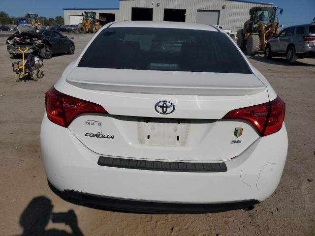 VIN 5YFBURHE9HP686056 2017 Toyota Corolla, L no.6