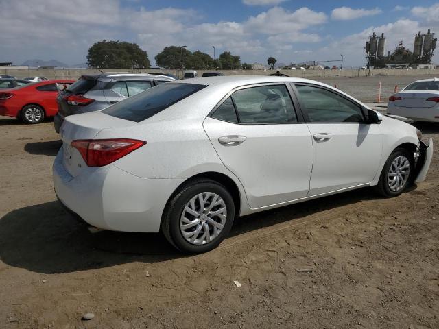 VIN 5YFBURHE4JP838251 2018 Toyota Corolla, L no.3