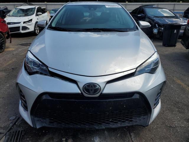 VIN 5YFBURHE7JP758569 2018 Toyota Corolla, L no.5