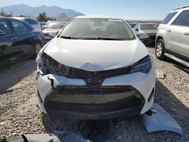 VIN 5YFBURHE7HP659017 2017 Toyota Corolla, L no.5