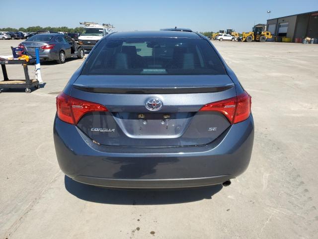 VIN 5YFBURHE3JP848527 2018 Toyota Corolla, L no.6