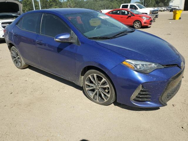 VIN 5YFBURHE7JP797470 2018 Toyota Corolla, L no.4