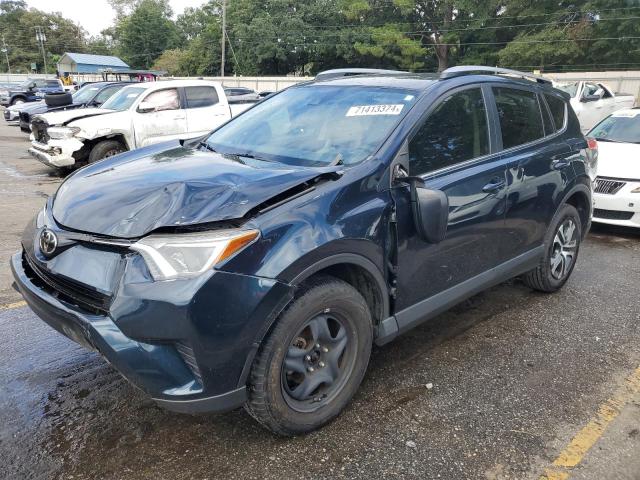 VIN JTMZFREV1HJ117509 2017 Toyota RAV4, LE no.1