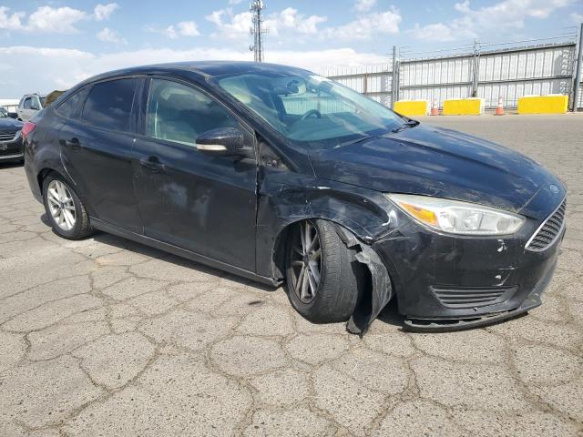 VIN 1FADP3F20GL315645 2016 Ford Focus, SE no.4