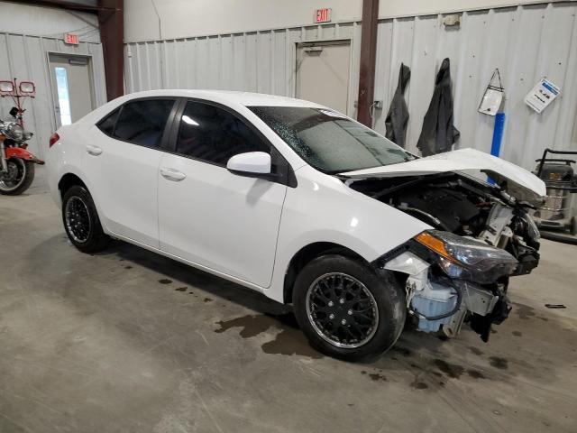 VIN 5YFBURHEXKP884717 2019 Toyota Corolla, L no.4