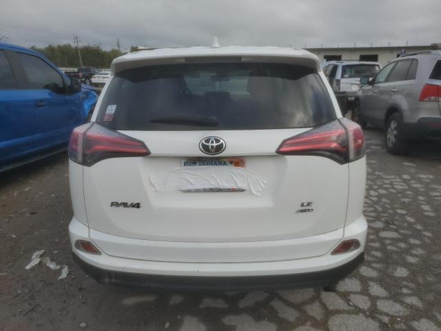 VIN JTMBFREV5JJ735522 2018 Toyota RAV4, LE no.6