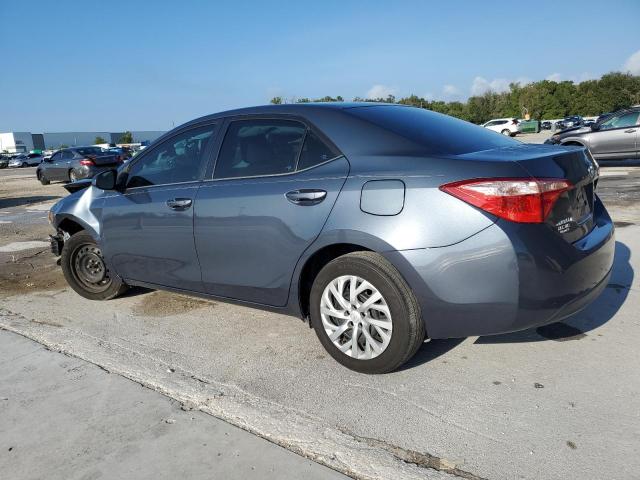 VIN 5YFBURHE4JP838671 2018 Toyota Corolla, L no.2