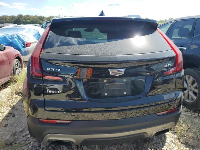 VIN 1GYFZCR42KF189185 2019 Cadillac XT4, Premium Lu... no.6