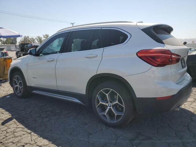 VIN WBXHT3C36J5F92807 2018 BMW X1 no.2