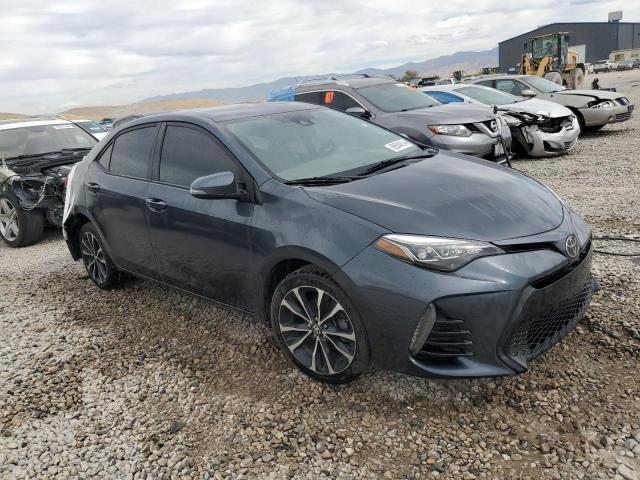 VIN 5YFBURHE4JP800048 2018 Toyota Corolla, L no.4