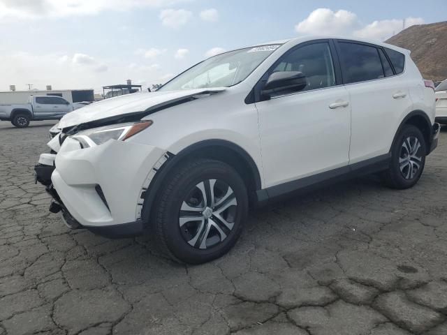 VIN JTMZFREV4JJ159484 2018 Toyota RAV4, LE no.1