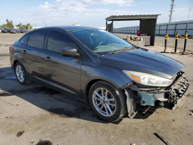 VIN 1FADP3FE8JL313563 2018 FORD FOCUS no.4