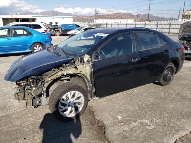 VIN 5YFBURHEXJP854647 2018 Toyota Corolla, L no.1