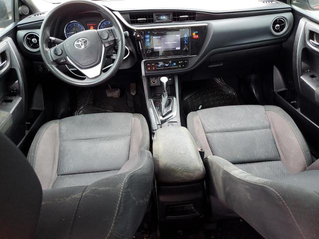 VIN 5YFBURHE2JP823005 2018 Toyota Corolla, L no.8