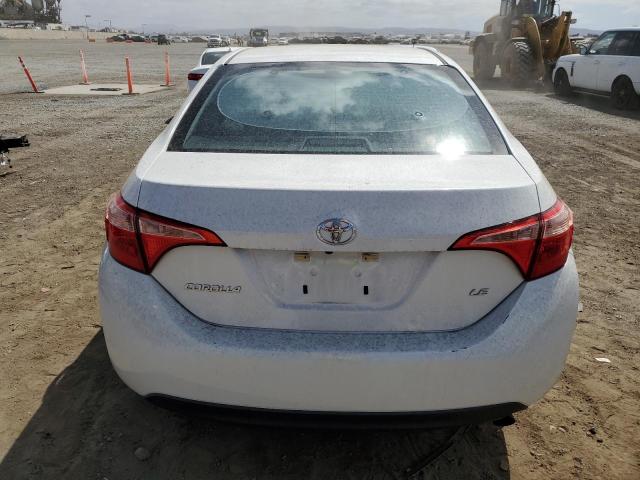 VIN 5YFBURHE4JP838251 2018 Toyota Corolla, L no.6