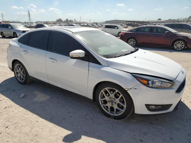 VIN 1FADP3F23FL281747 2015 Ford Focus, SE no.4