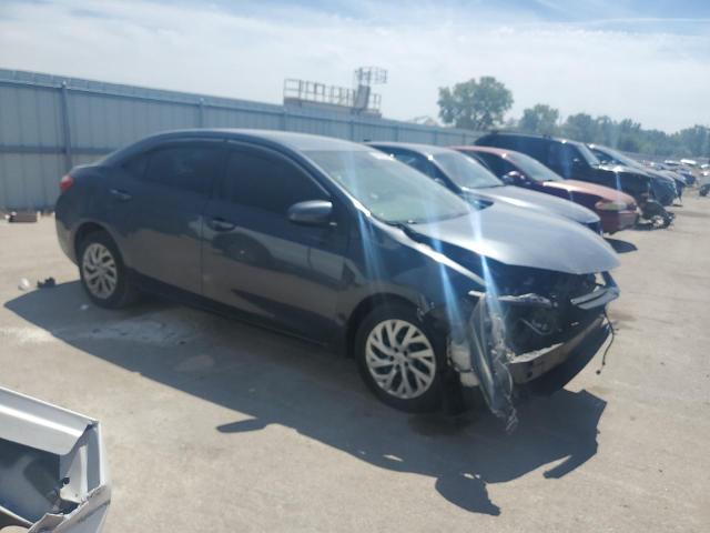 VIN 5YFBURHE4JP774292 2018 Toyota Corolla, L no.4