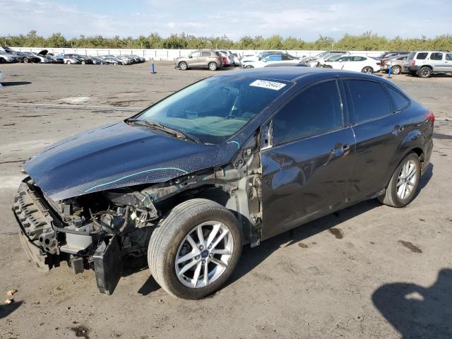 VIN 1FADP3FE8JL313563 2018 FORD FOCUS no.1