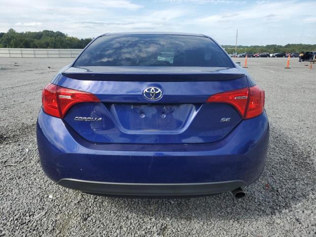 VIN 5YFBURHE6JP831754 2018 Toyota Corolla, L no.6