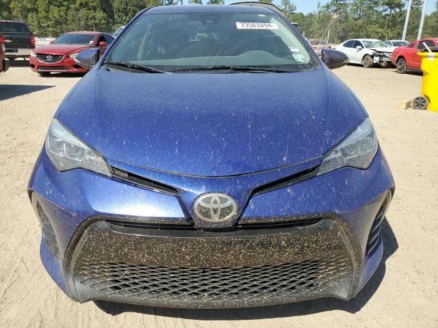 VIN 5YFBURHE7JP797470 2018 Toyota Corolla, L no.5