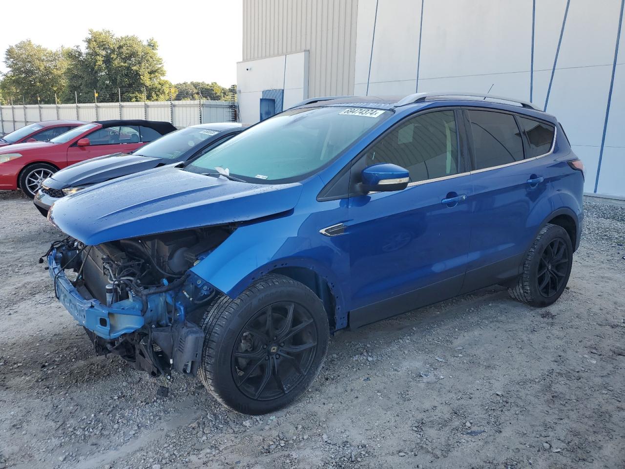 1FMCU9JD3HUD21361 FORD ESCAPE TIT 2017