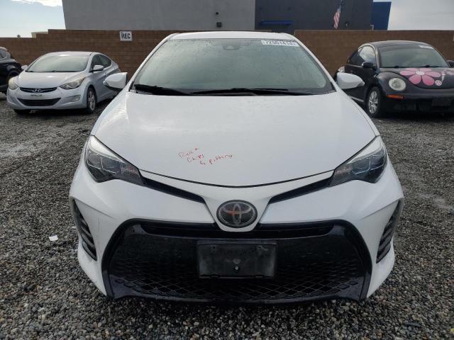 VIN 5YFBURHE7JP801386 2018 Toyota Corolla, L no.5