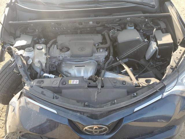 VIN JTMBFREV6JJ223901 2018 Toyota RAV4, LE no.11