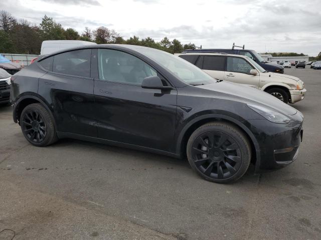 VIN 7SAYGDEE2PA181415 2023 Tesla MODEL Y no.4