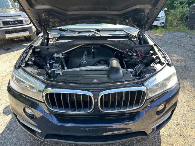 VIN 5UXKR0C50E0H25144 2014 BMW X5 no.7