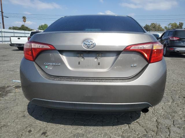 VIN 5YFBURHE3JP829623 2018 Toyota Corolla, L no.6