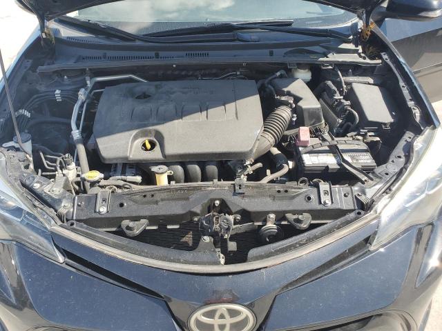 VIN 5YFBURHEXHP635911 2017 Toyota Corolla, L no.11