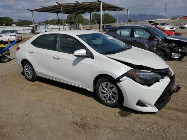 VIN 5YFBURHE4JP838251 2018 Toyota Corolla, L no.4