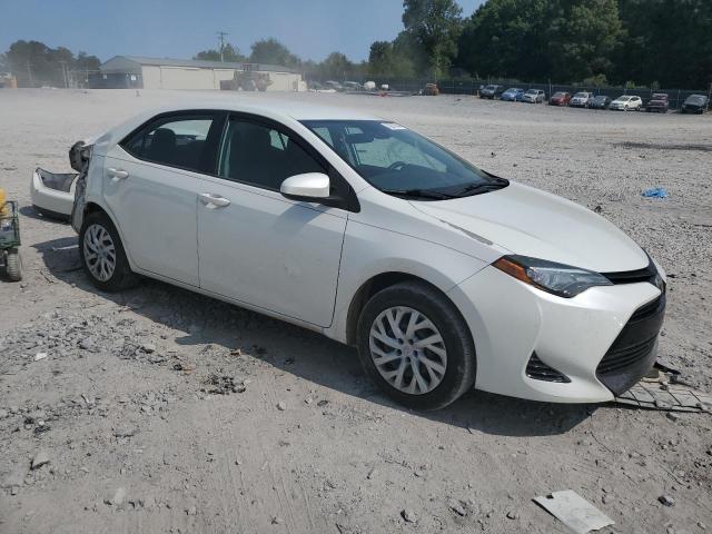 VIN 5YFBURHE5HP649960 2017 Toyota Corolla, L no.4