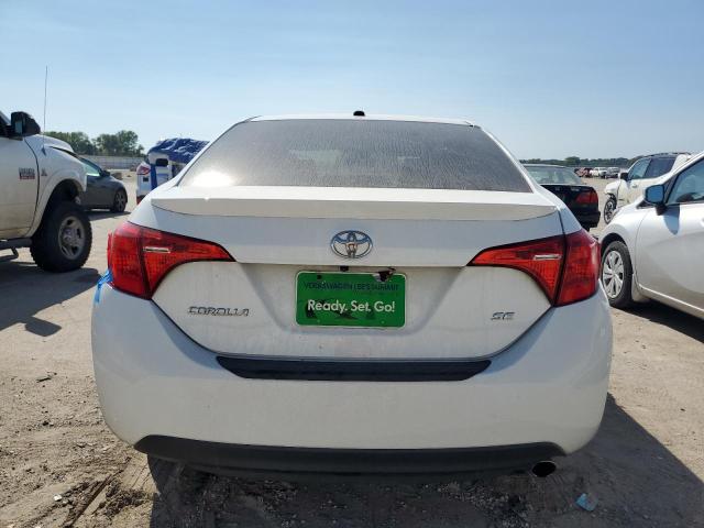 VIN 5YFBURHE3HP620912 2017 Toyota Corolla, L no.6