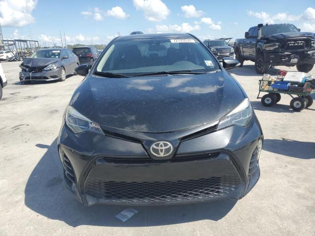 VIN 5YFBURHEXHP635911 2017 Toyota Corolla, L no.5